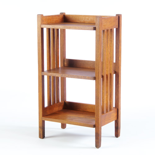 Appraisal: STICKLEY BROTHERS Three-shelf magazine stand with three vertical slats to