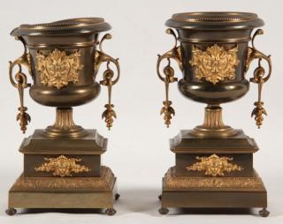 Appraisal: PAIR OF FRENCH BRONZE AND DORE MOUNTED DOUBLE HANDLED URNS