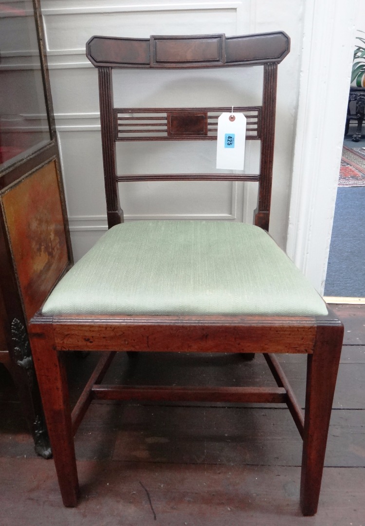 Appraisal: A pair of George III mahogany dining chairs with drop-in