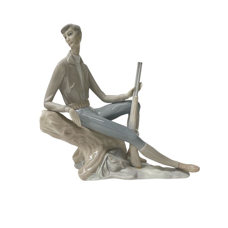 Appraisal: Lladro boy with rifle porcelain Figure Lladro boy with rifle