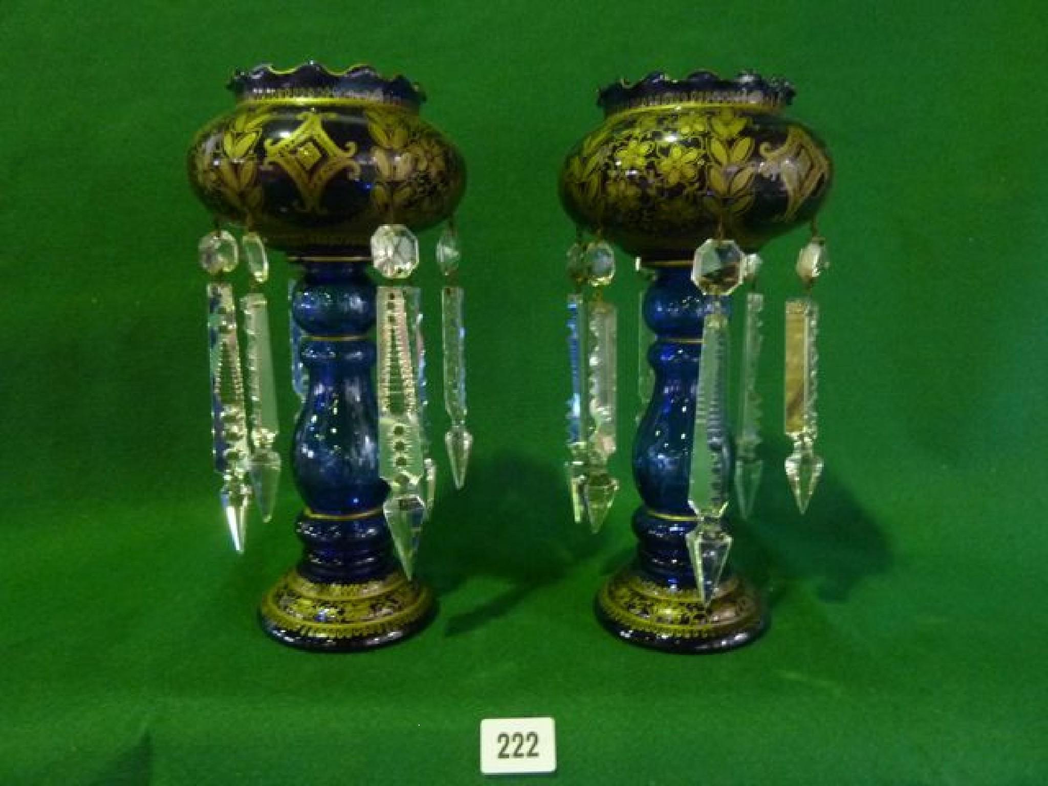 Appraisal: Two th century blue and gilded table lustres cm high