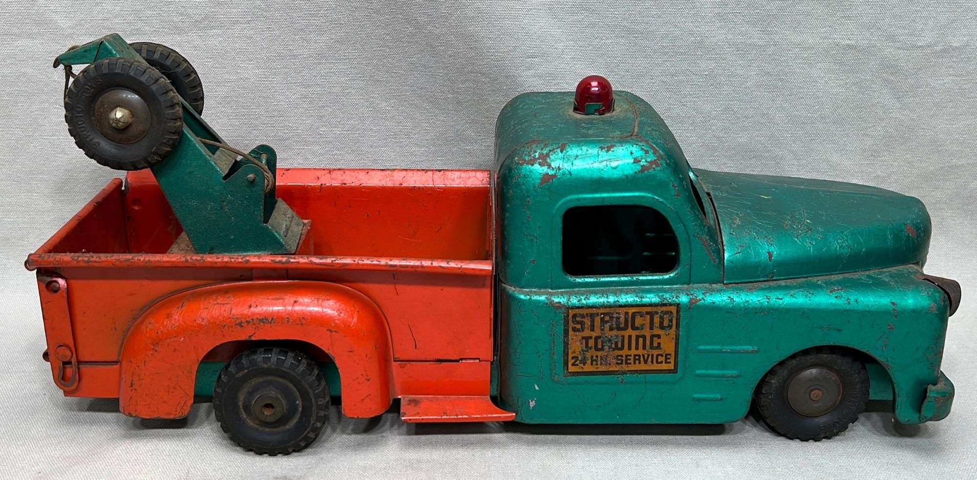 Appraisal: Structo Towing Hr Service pressed steel tow truck toymid th