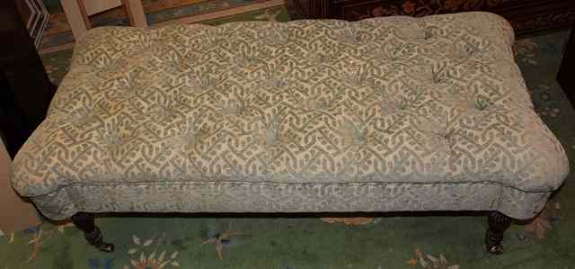 Appraisal: A LOW BUTTON UPHOLSTERED STOOL with out stepped rounded corners