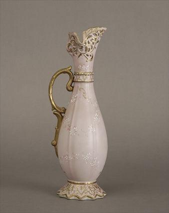 Appraisal: Continental Pink-Ground Porcelain Ewer-Form Vase with Gilt and White Floral