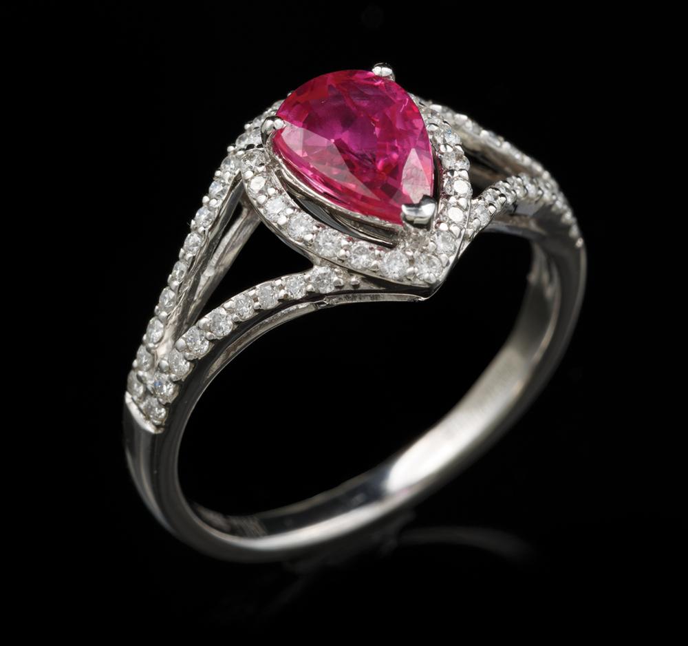 Appraisal: Platinum Ruby and Diamond Ring center prong set pear mixed