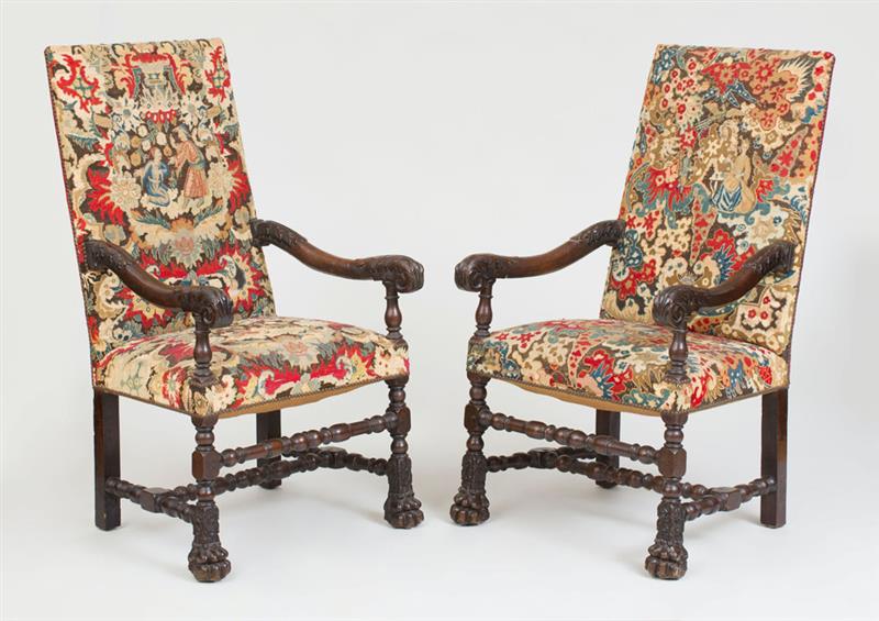 Appraisal: PAIR OF FRANCO-FLEMISH BAROQUE CARVED WALNUT TALL-BACK ARMCHAIRS Upholstered in