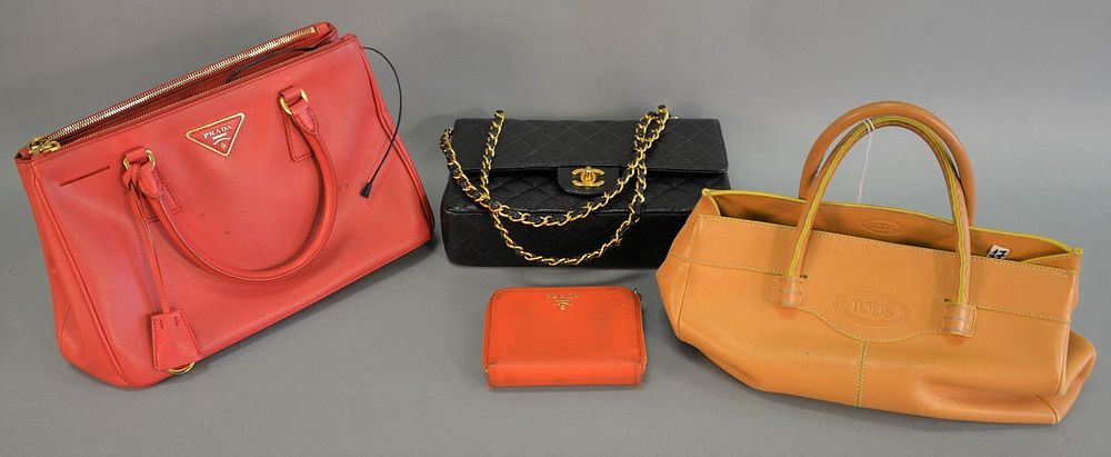 Appraisal: Group of four purses and wallets including Prada red handbag