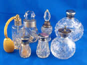 Appraisal: Six cut glass sterling silver mounted perfume bottles one with