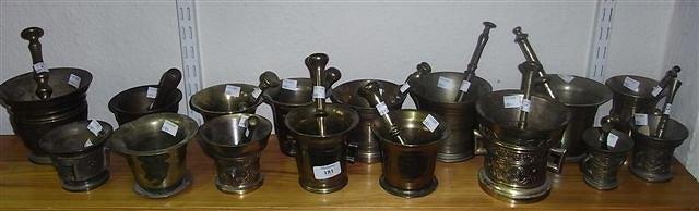 Appraisal: A COLLECTION OF REPRODUCTION BRONZE AND OTHER METAL PESTLE AND