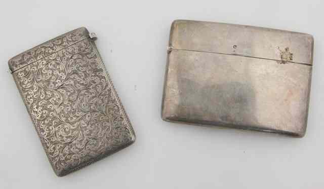 Appraisal: A silver visiting card case Sheffield engraved scrolls etc and