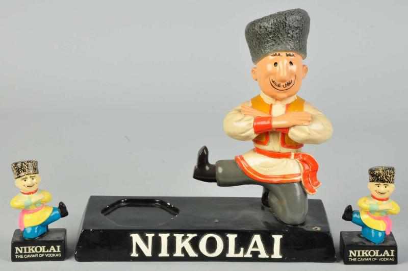 Appraisal: Lot of Advertising FIgures Includes two s Nikolai Vodka one