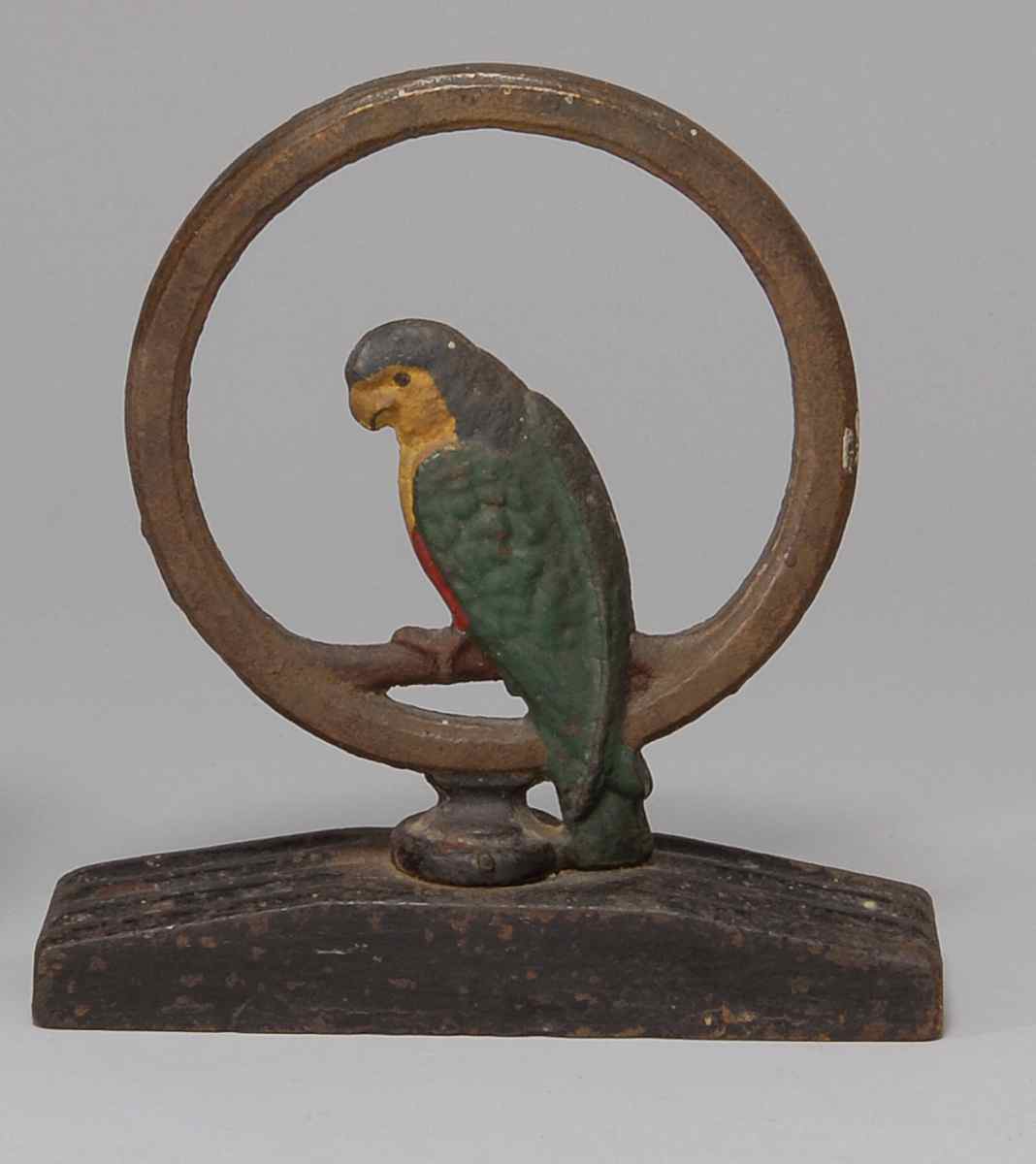 Appraisal: CAST IRON DOORSTOP In the form of a parrot on