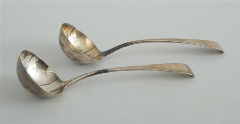 Appraisal: PAIR OF GEORGE III SILVER GRAVY LADLES William Eley and