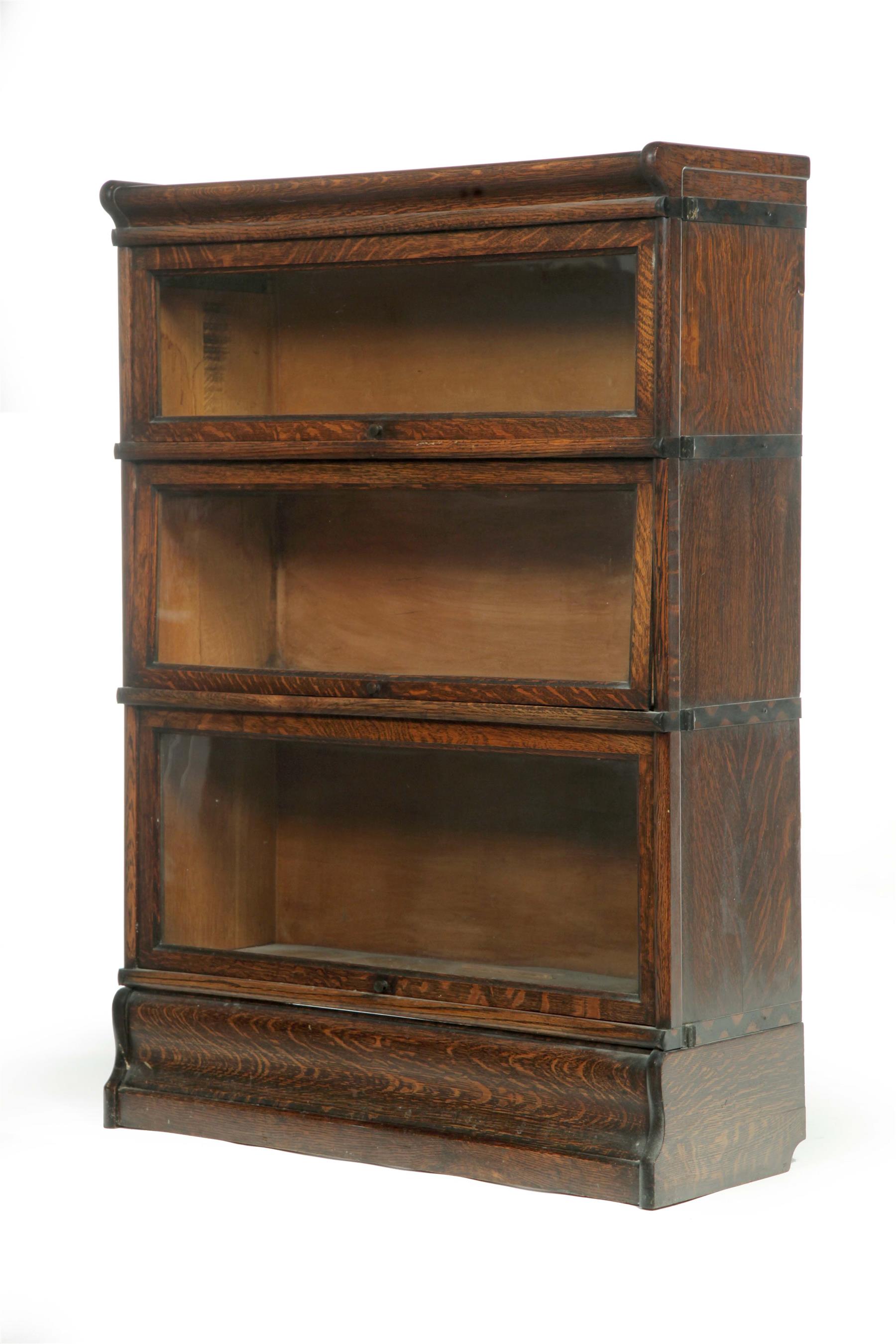 Appraisal: THREE-SECTION STACKING BOOKCASE American st quarter- th century oak Graduated