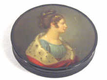 Appraisal: A circular papier mache snuff box the lid hand painted