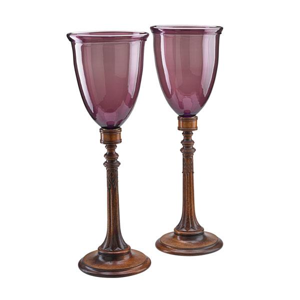 Appraisal: PAIR OF TREEN CANDLESTICKS With amethyst hurricane shades Continental th