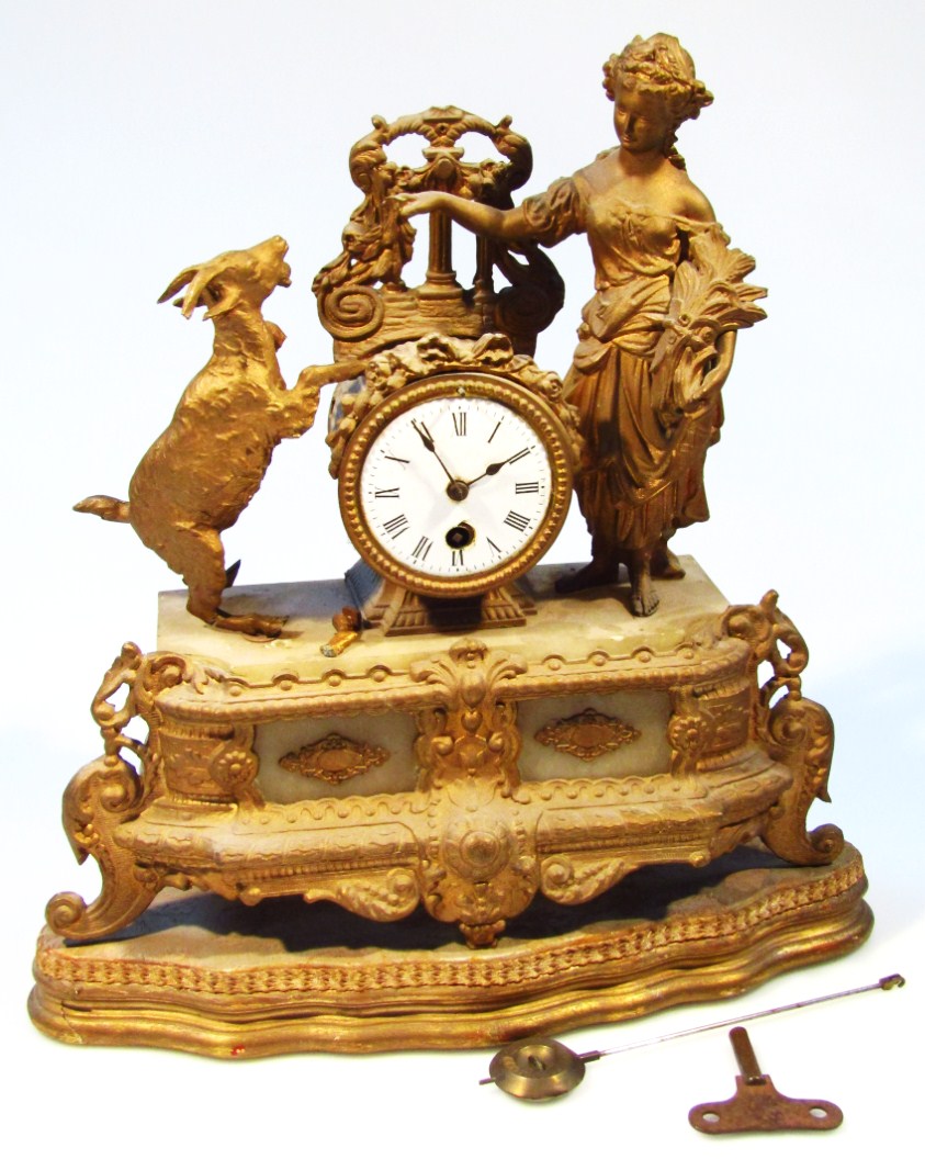 Appraisal: A thC gilt metal mantel clock with cm dia enamel