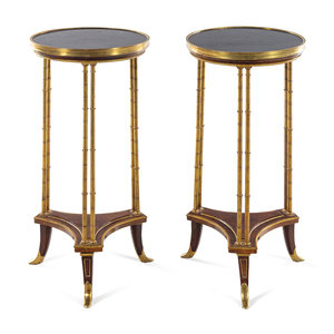 Appraisal: A Pair of French Gilt Bronze Marble-Top Gu ridons Manner