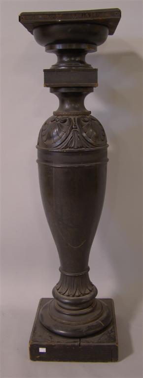 Appraisal: CLASSICAL REVIVAL BLACK PAINTED SHELL CARVED PEDESTAL having a square