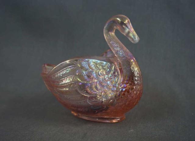 Appraisal: Imperial Pink Carnival Glass Open Swan Dish Produced - by