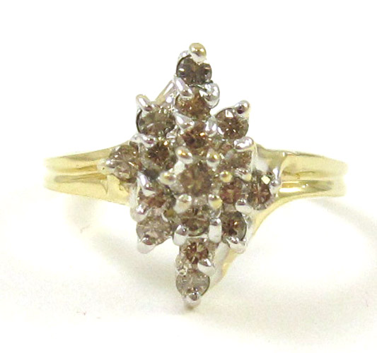 Appraisal: DIAMOND AND FOURTEEN KARAT GOLD CLUSTER RING set with round-cut