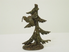 Appraisal: Bronzed over base metal quail in a pine tree height