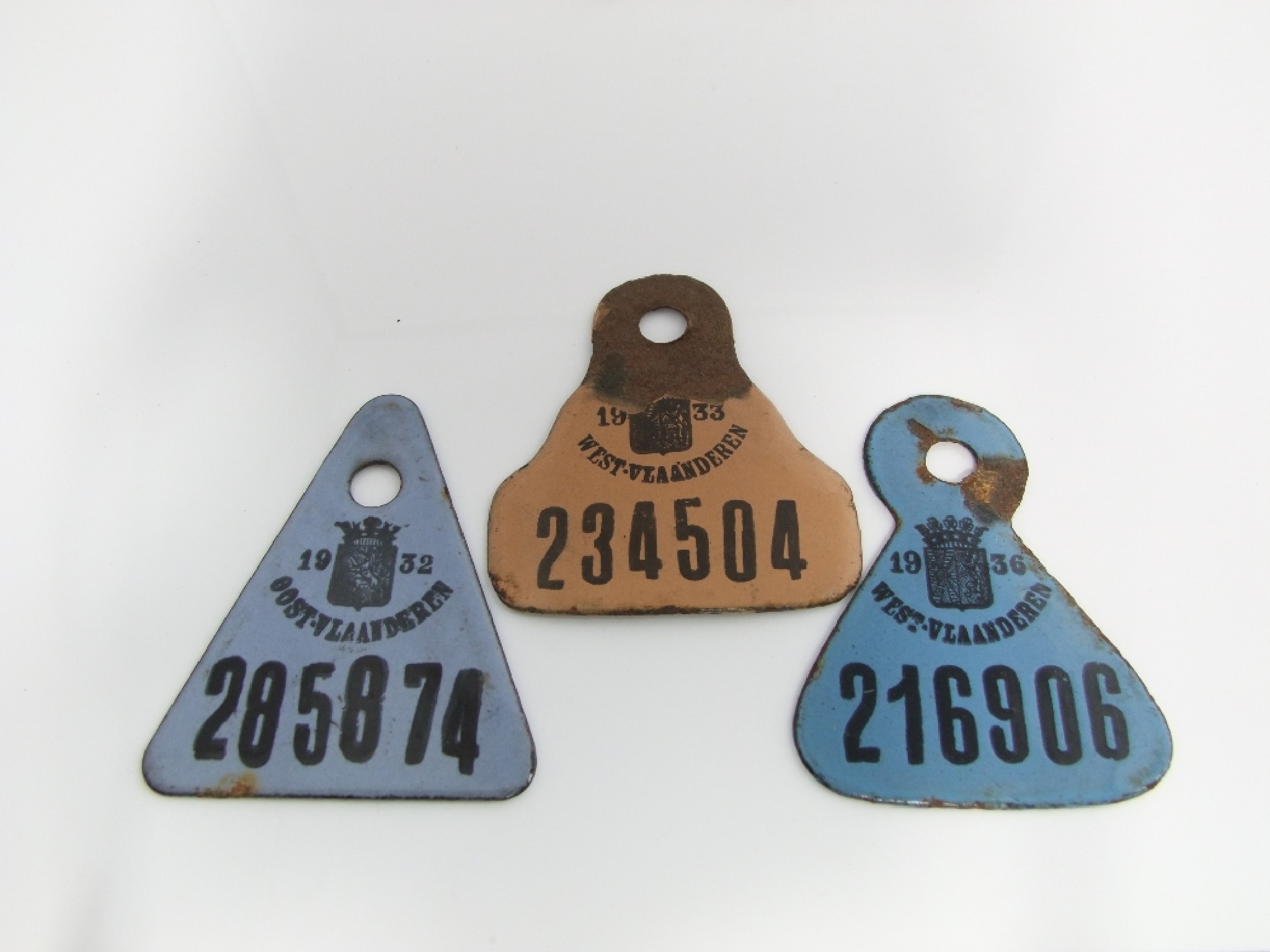 Appraisal: Three s Belgian enamel licence tags West Vlanderen