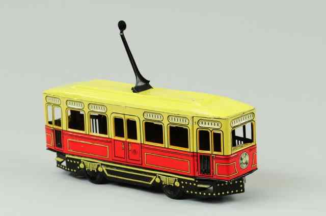 Appraisal: GUNTHERMANN TROLLEY Germany lithographed tin red and yellow body electric