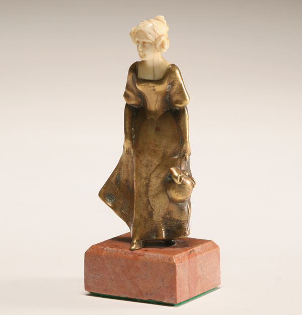 Appraisal: Continental dore bronze and ivory sculpture of a female figure