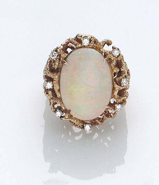 Appraisal: An opal diamond and k gold ring gross weight approximately