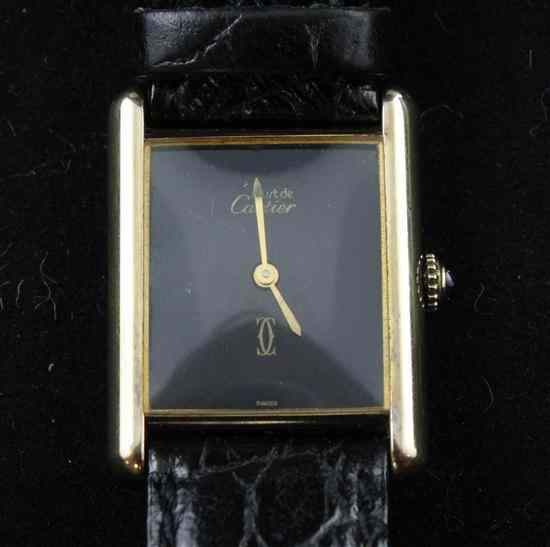 Appraisal: A silver gilt Must de Cartier wrist watch with rectangular