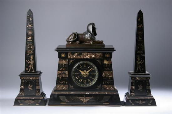 Appraisal: FRENCH EGYPTIAN-STYLE MARBLE AND BRONZE CLOCK GARNITURE circa The tomb