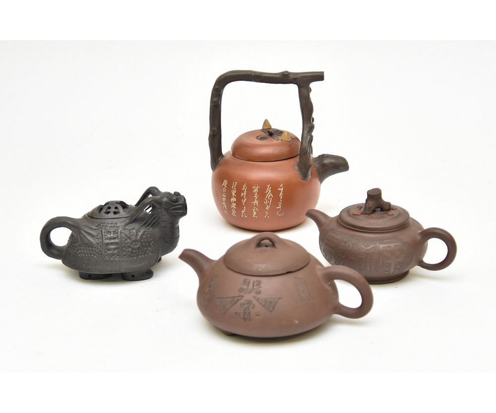 Appraisal: Four Chinese Pottery Teapots Four Chinese pottery teapots all signed