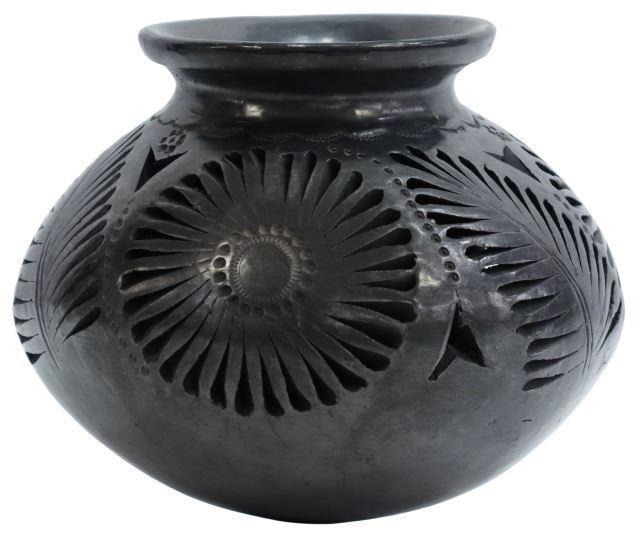 Appraisal: Blackware pottery olla Oaxaca Mexico pierced design with floral blooms