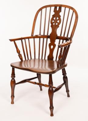 Appraisal: A stick and pierced splat back armchair with solid elm