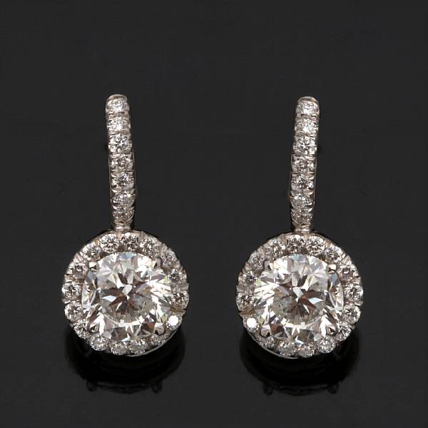 Appraisal: A pair of diamond earrings centering two round brilliant-cut diamonds