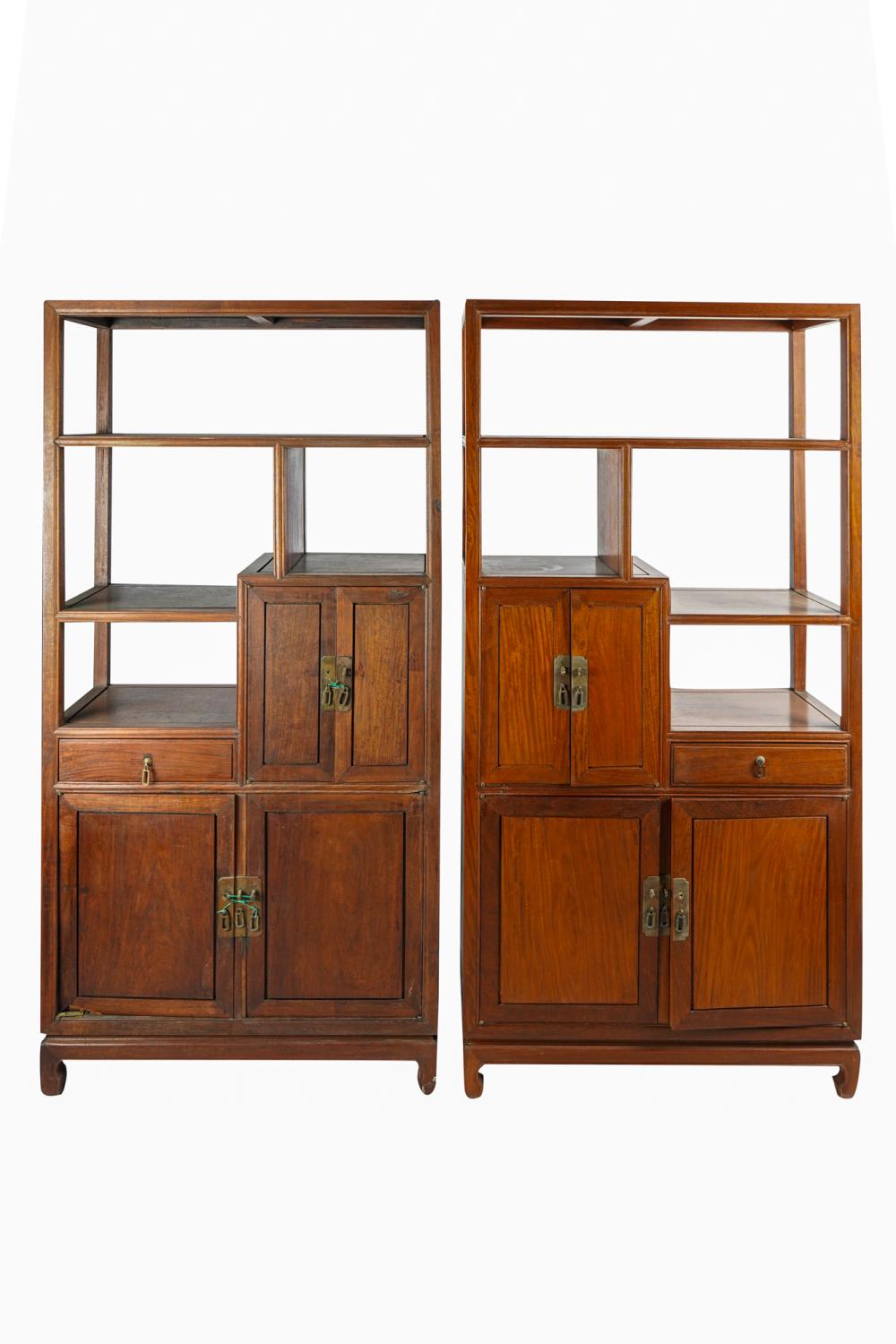 Appraisal: PAIR OF CHINESE ETAGERESeach with doors and drawers on front