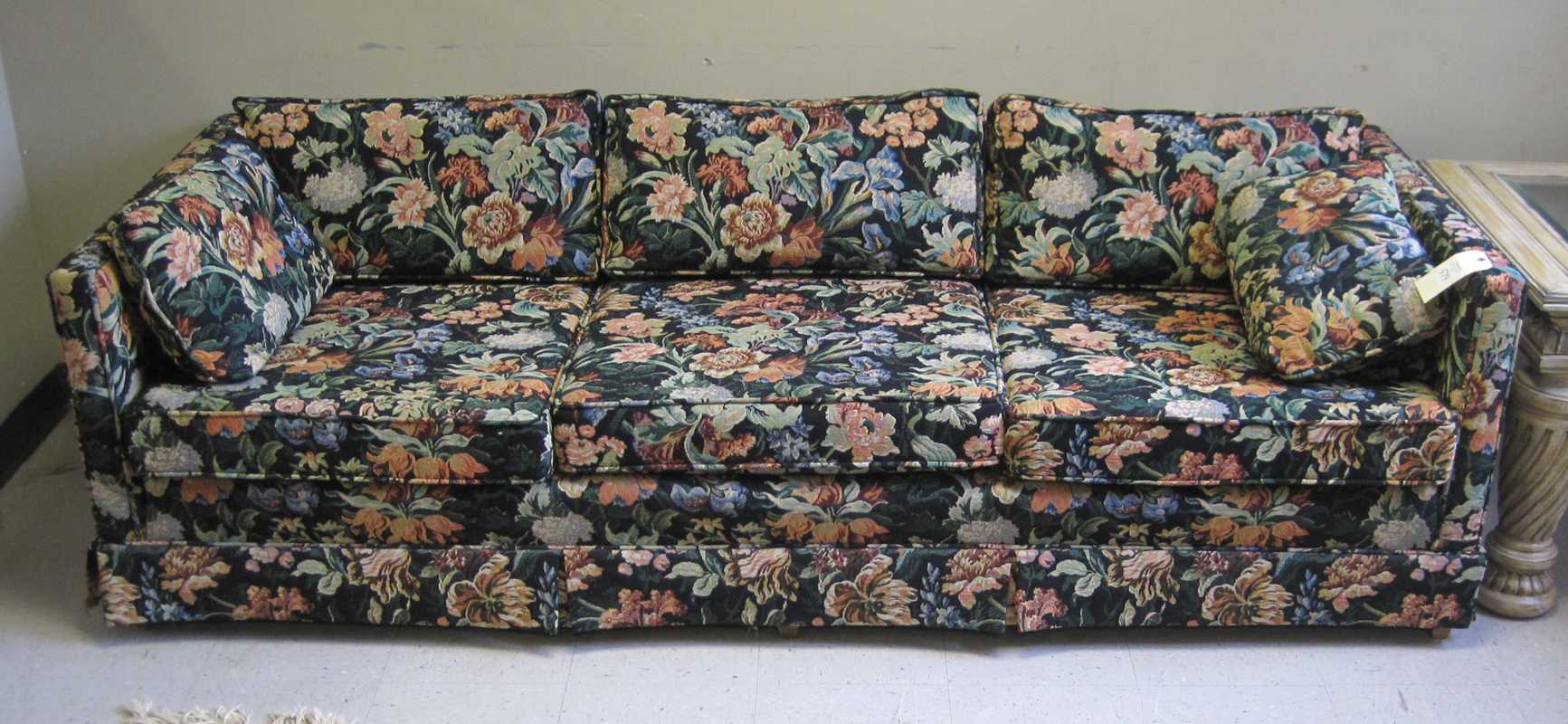 Appraisal: MID-CENTURY MODERN LONG SOFA American made recent floral tapestry upholstery