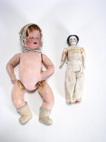 Appraisal: Two antique baby dolls including china head with cloth body