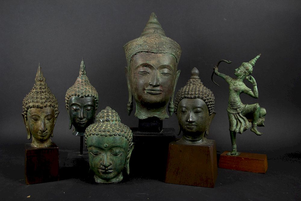 Appraisal: Group of Cambodian Bronze Heads and Buddha Five heads of