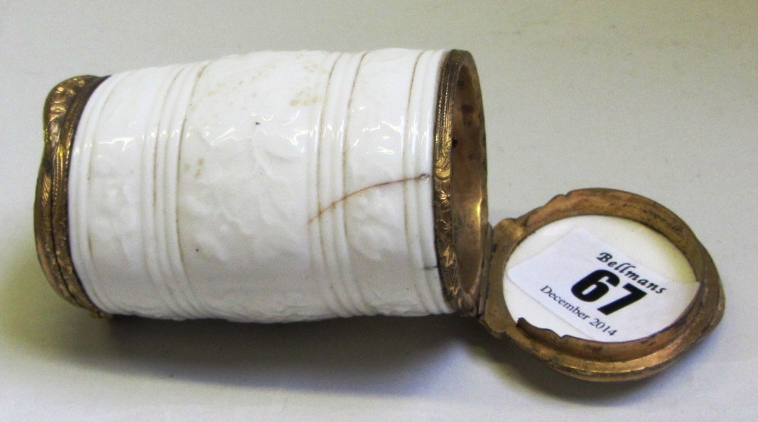 Appraisal: A Contintental white porcelain and gilt-metal mounted double ended snuff