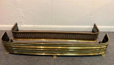 Appraisal: A pierced brass fire curb cm wide and another on