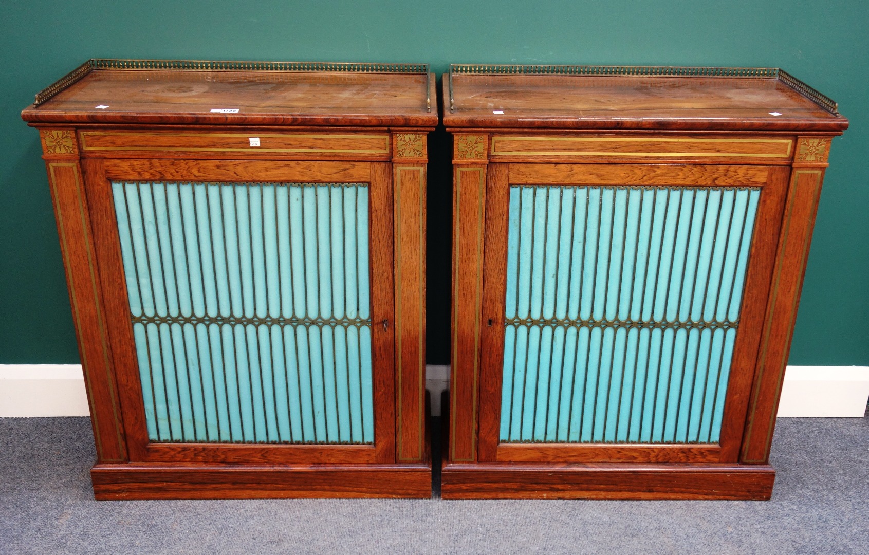 Appraisal: A pair of Regency design brass inlaid rosewood side cabinets