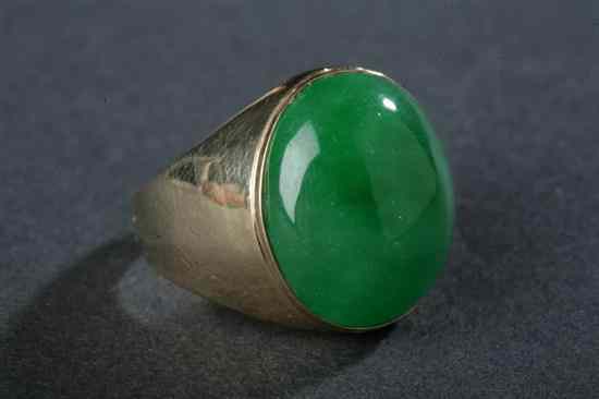 Appraisal: K YELLOW GOLD RING AND GREEN JADE CABOCHON GENTLEMAN'S RING