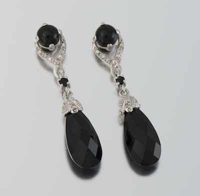 Appraisal: A Pair of Onyx and Diamond Earrings k white gold