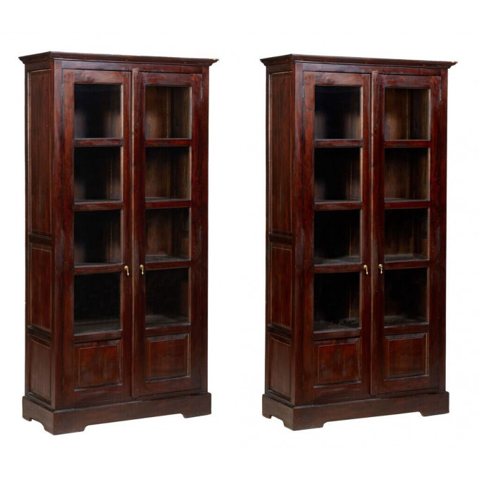 Appraisal: Pair of Tall Indonesian Carved Mahogany Bookcases th c the