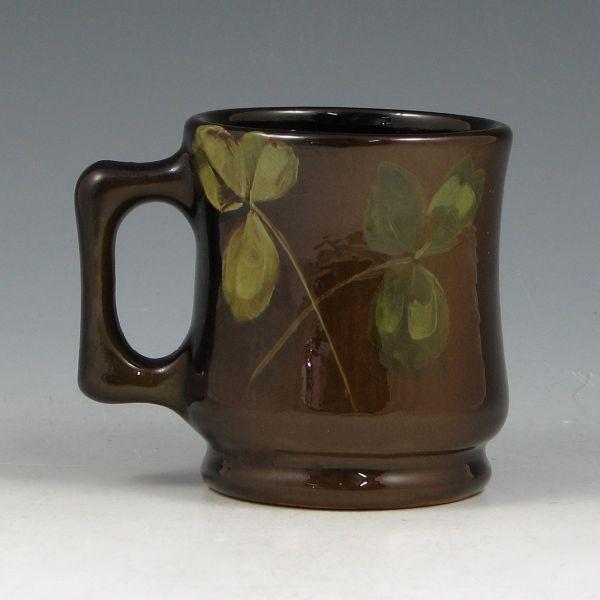 Appraisal: Weller Louwelsa mug with clover decoration under standard glaze Signed