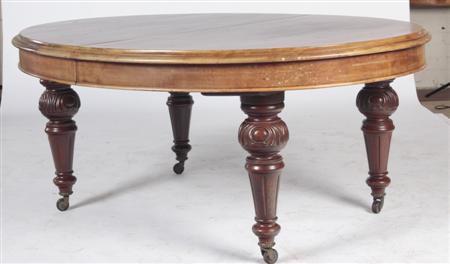 Appraisal: A Victorian mahogany extending dining table the moulded oval top