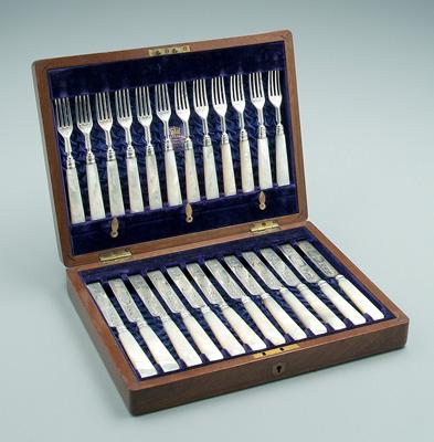 Appraisal: Cased English silver fruit set round mother-of-pearl handles six forks