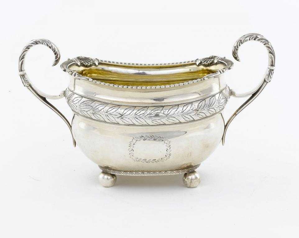 Appraisal: A GEORGE III SUGAR BOWL the rim with shells to